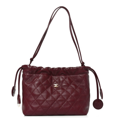 Chanel Pony Hair Printed Quilted Drawstring Clutch With Strap White Black Dark Burgundy 1 of 10