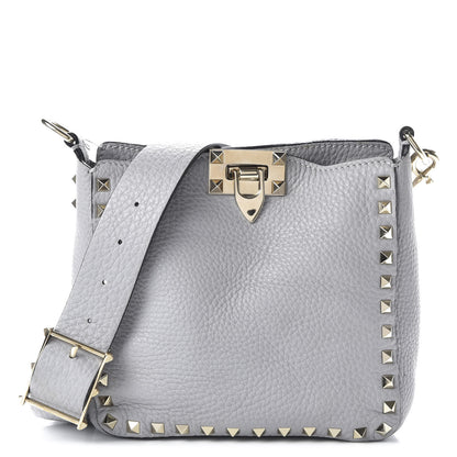 Valentino Garavani Pebbled Calfskin Mini Rockstud Flip-Lock Messenger Bag Pastel Grey 1 of 10