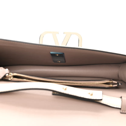 Valentino Garavani Metallic Calfskin VSling Clutch With Shoulder Strap Sahara 5 of 9