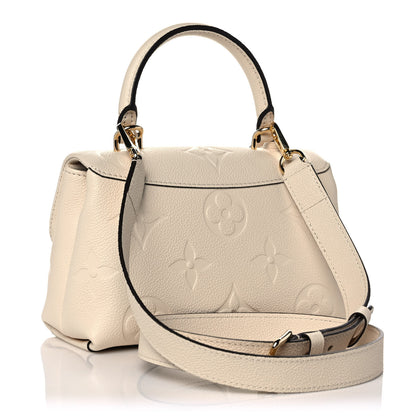 Louis Vuitton Madeleine BB Creme 2 of 9
