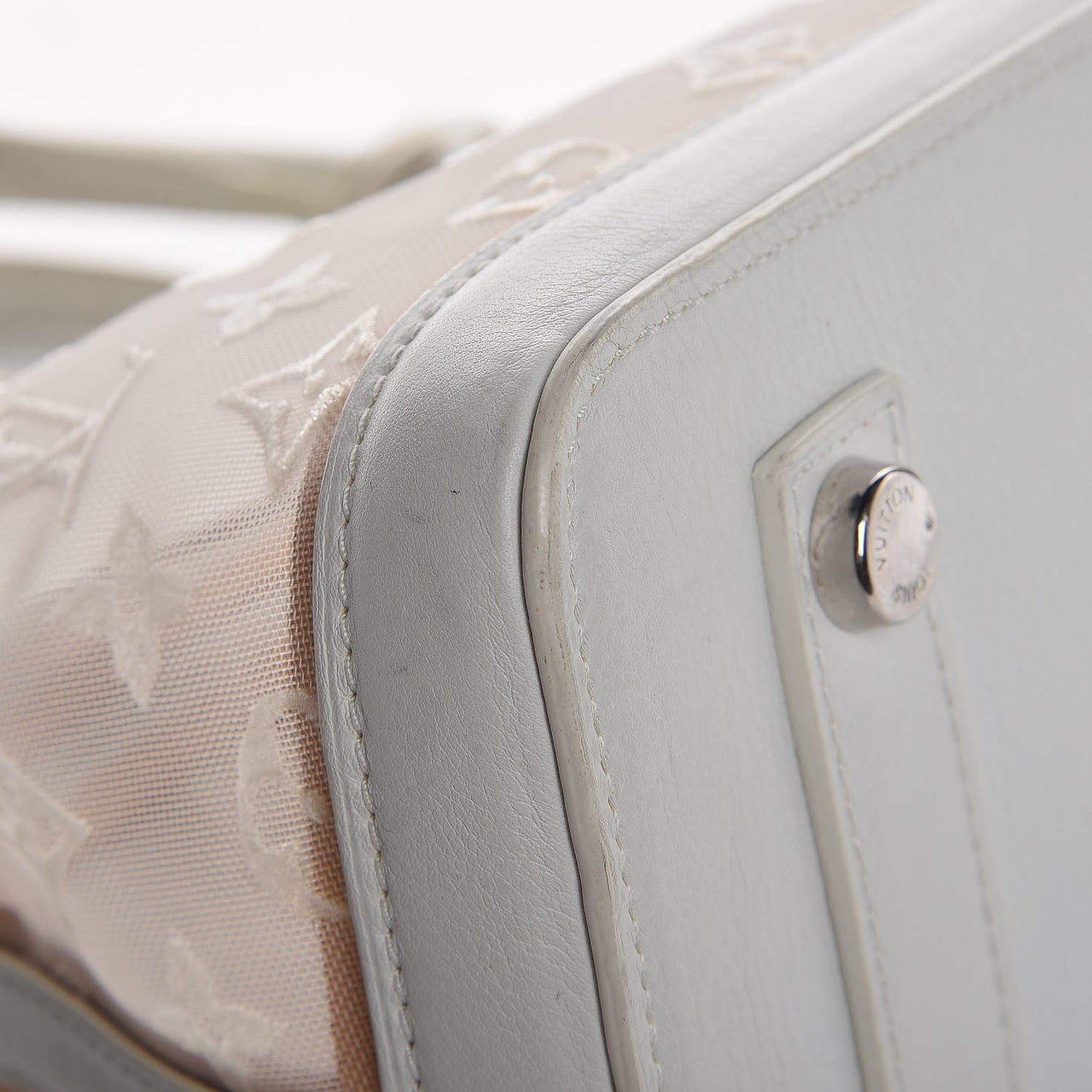 Monogram Transparence Lockit East-West White