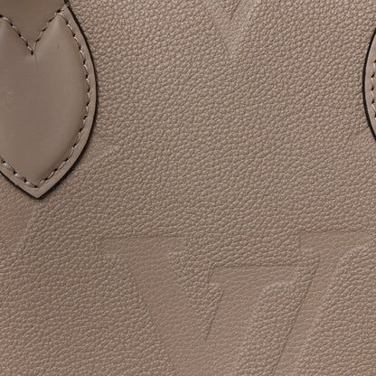 Louis Vuitton Empreinte Monogram Giant Onthego MM Tourterelle 7 of 9