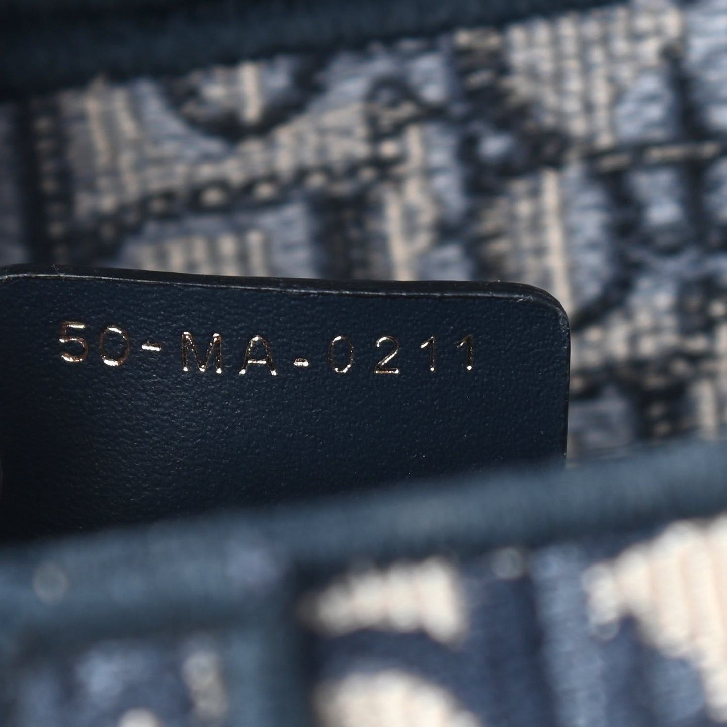 Oblique Embroidered Saddle Bag Blue