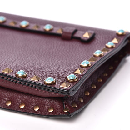 Valentino Garavani Pebbled Calfskin Rockstud Rolling Wristlet Clutch Rubin 7 of 11