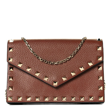 Valentino Garavani Pebbled Calfskin Rockstud Envelope Wallet on Chain Bright Cognac 1 of 6
