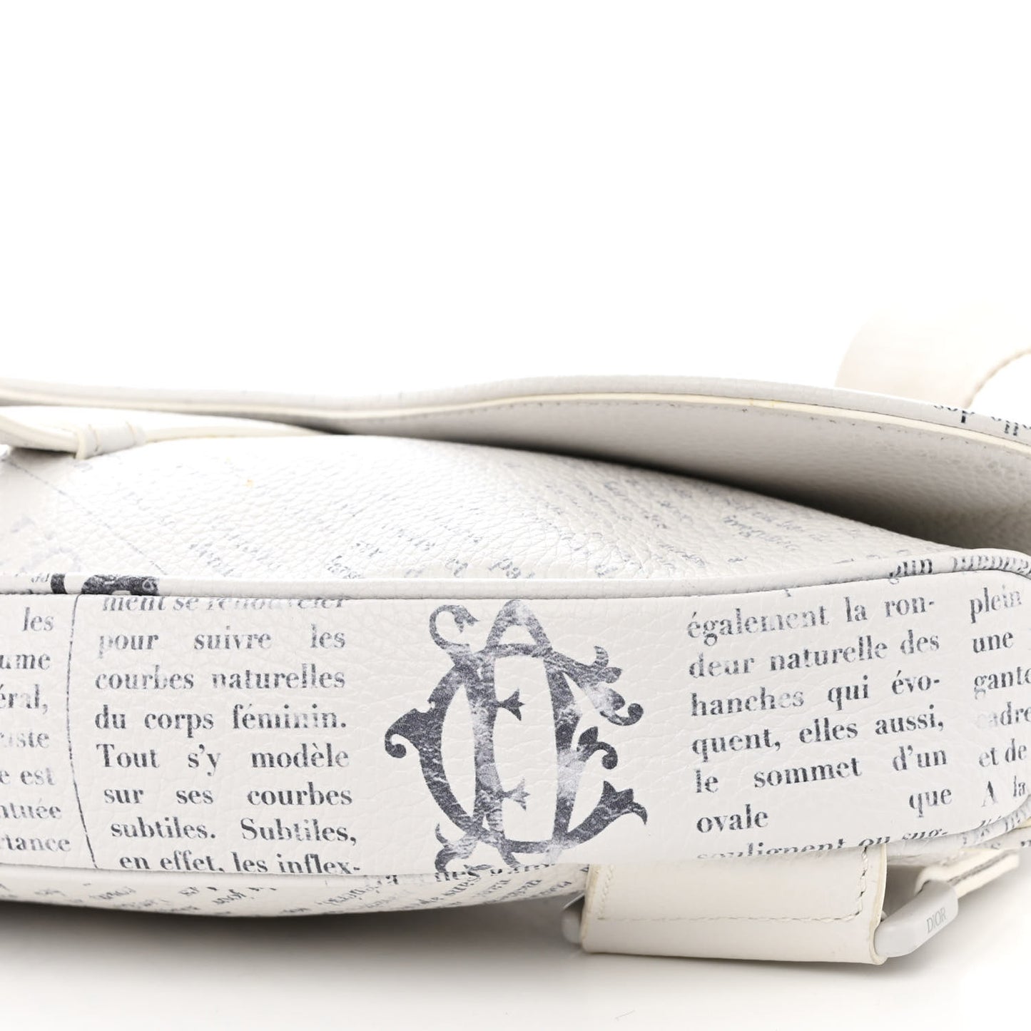 X Daniel Arsham Grained Calfskin Newspaper Print Saddle Bag White