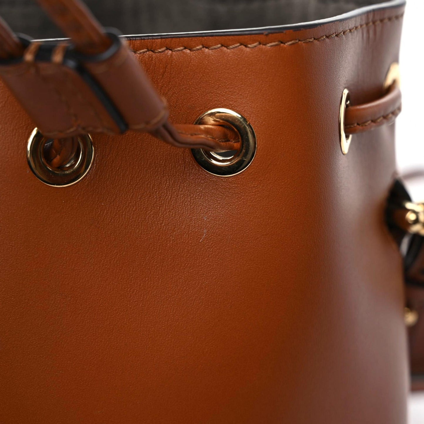 Vitello King F is Fendi Logo Embossed Mini Mon Tresor Bucket Bag Cuoio