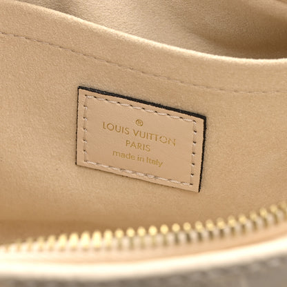 Louis Vuitton Empreinte Monogram Giant OnTheGo East West Creme 6 of 9