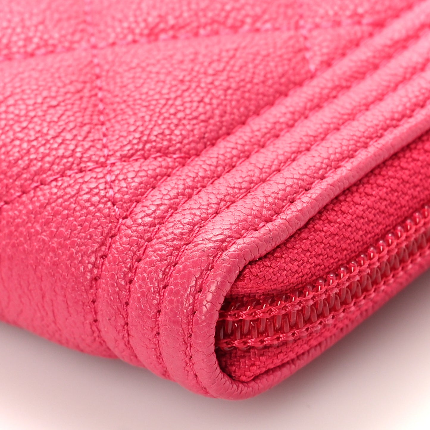 Caviar Quilted Small Boy Zip Around Wallet Fuchsia