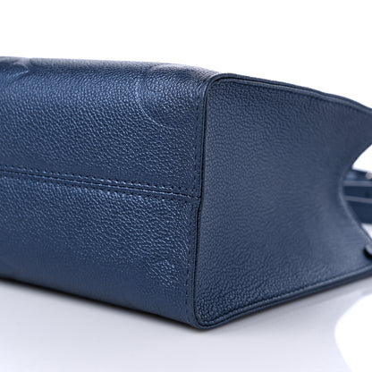 Louis Vuitton Metallic Empreinte Monogram Giant Onthego PM Navy Nacre 8 of 8