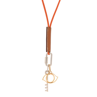 Hermes Palladium Permabrass Curiosite Pendant Necklace Orange Gold 1 of 7