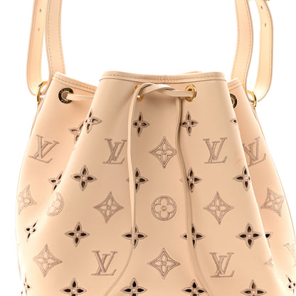 Louis Vuitton Calfskin Monogram Cutout Petit Noe Neutral 7 of 12