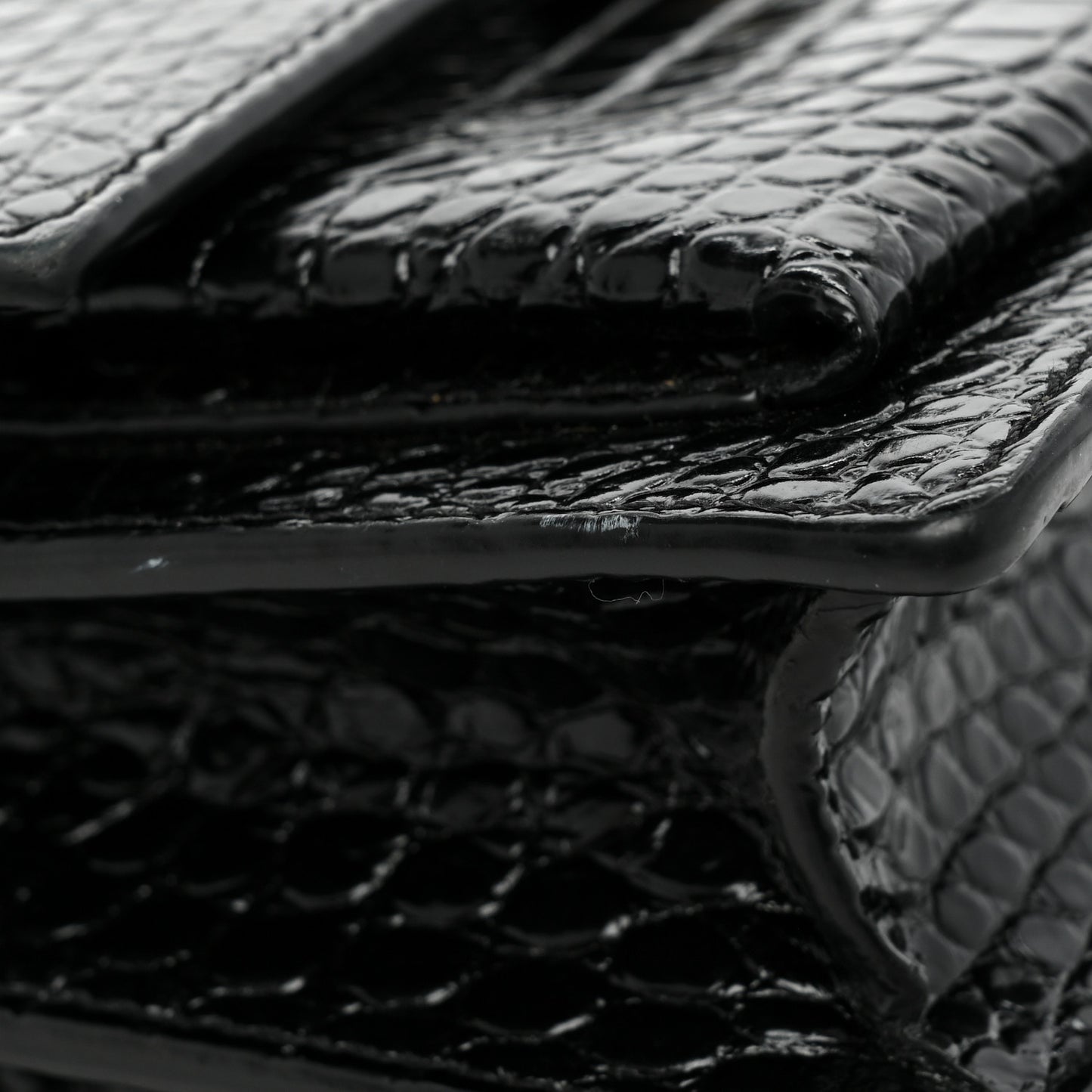 Calfskin Crocodile Embossed Medium Monogram Sunset Black
