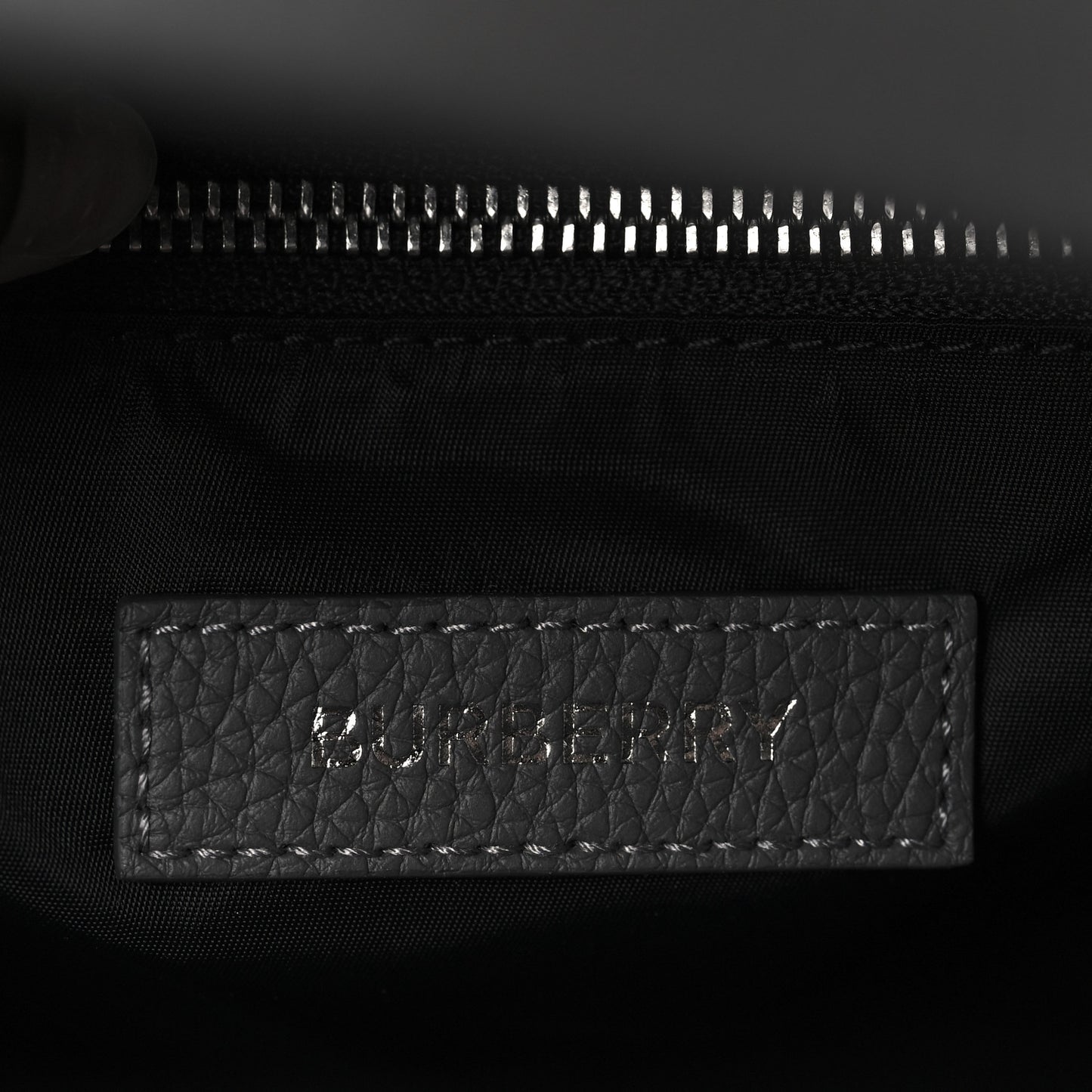 Calfskin Logo Embossed Backpack Charcoal Grey