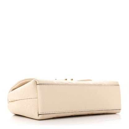 Louis Vuitton Empreinte Monogram Nano Madeleine Creme 4 of 10