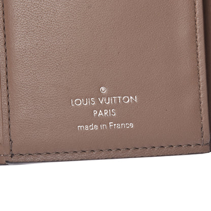 Louis Vuitton Taurillon Capucines Compact Wallet Magnolia 6 of 7