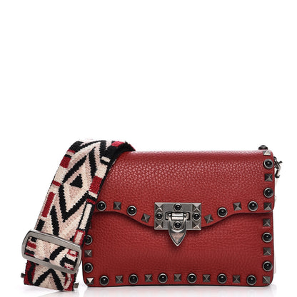 Valentino Garavani Pebbled Calfskin Small Guitar Strap Rockstud Rolling Flip Lock Crossbody Bag Rubin 1 of 6