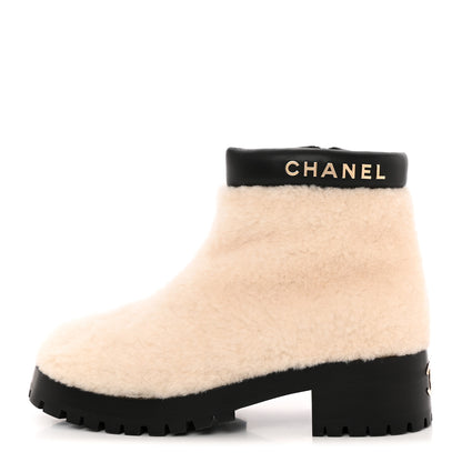 Chanel Shearling Lambskin Logo Ankle Boots 40 Ivory Black 1 of 9