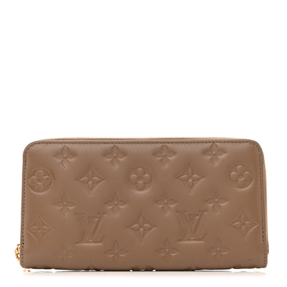 Louis Vuitton Lambskin Embossed Monogram Coussin Zippy Wallet Taupe 1 of 8