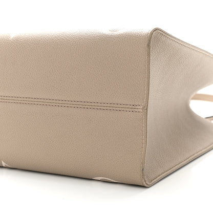 Louis Vuitton Empreinte Monogram Giant Onthego MM Tourterelle Creme 9 of 11