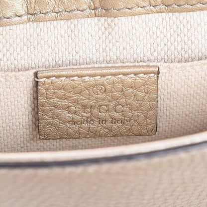 Gucci Metallic Pebbled Calfskin Small Soho Flap Crossbody Golden Beige 6 of 7
