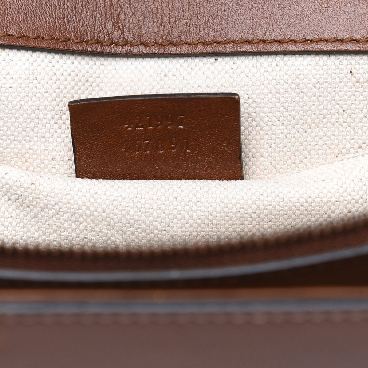 Calfskin Medium Cat Lock Top Handle Bag Brown