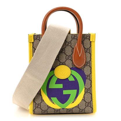 Gucci GG Supreme Monogram Textured Dollar Calfskin Heart Interlocking G Mini Vertical Tote Beige Ebony Harness Brown Yellow 1 of 10