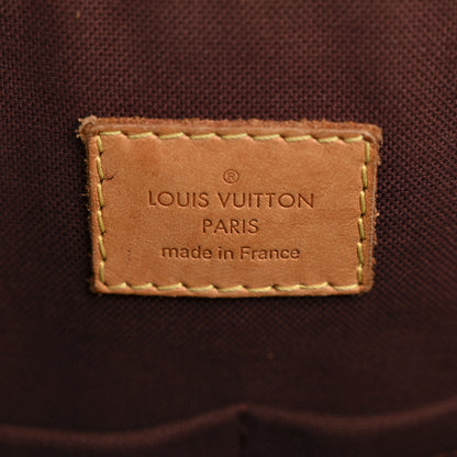 Louis Vuitton Monogram Rivoli MM 6 of 13