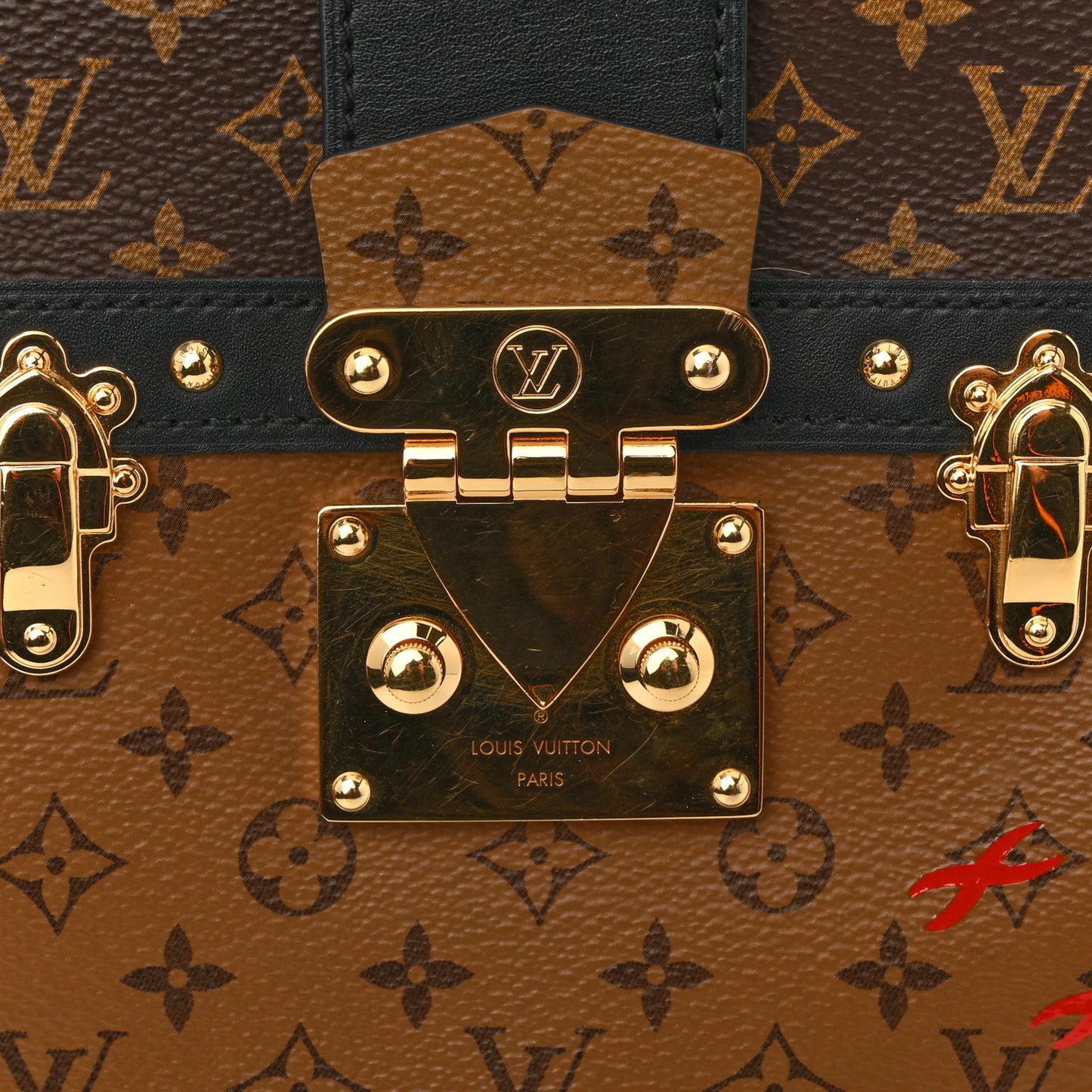 Reverse Monogram Trunk Clutch