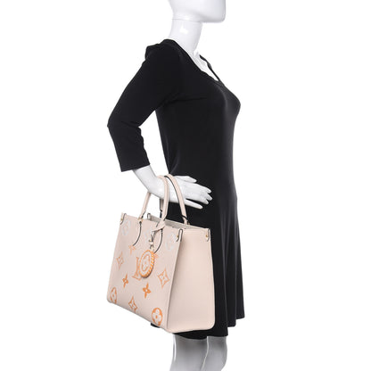 Louis Vuitton Empreinte Monogram Giant By The Pool Onthego MM Cream Saffron 3 of 11