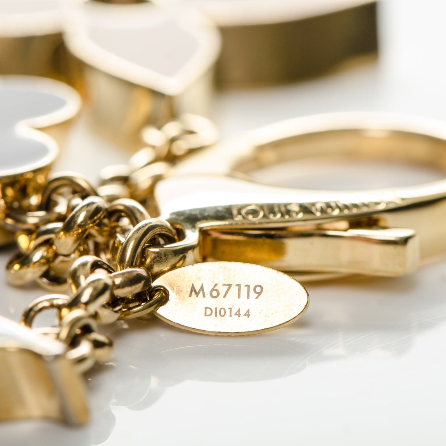Fleur De Monogram Bag Charm Dore