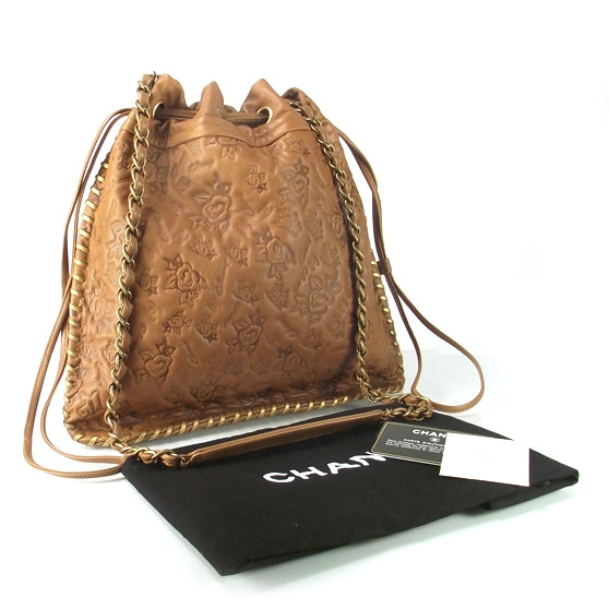 Chanel Leather Camellia Embossed Drawstring Shoulder Bag 3 of 8