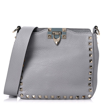Valentino Garavani Pebbled Calfskin Mini Rockstud Flip-Lock Messenger Bag Pastel Grey 1 of 8