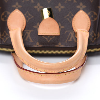 Louis Vuitton Monogram Rivoli PM 8 of 13
