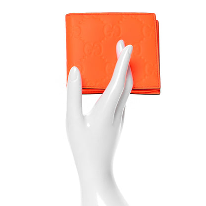 Gucci Rubber Effect GG Embossed Bi-Fold Wallet Fluorescent Orange 2 of 8