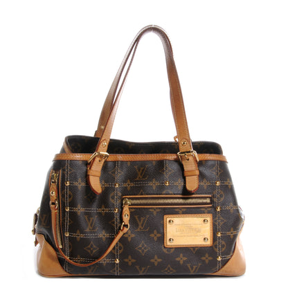 Louis Vuitton Monogram Riveting 1 of 8