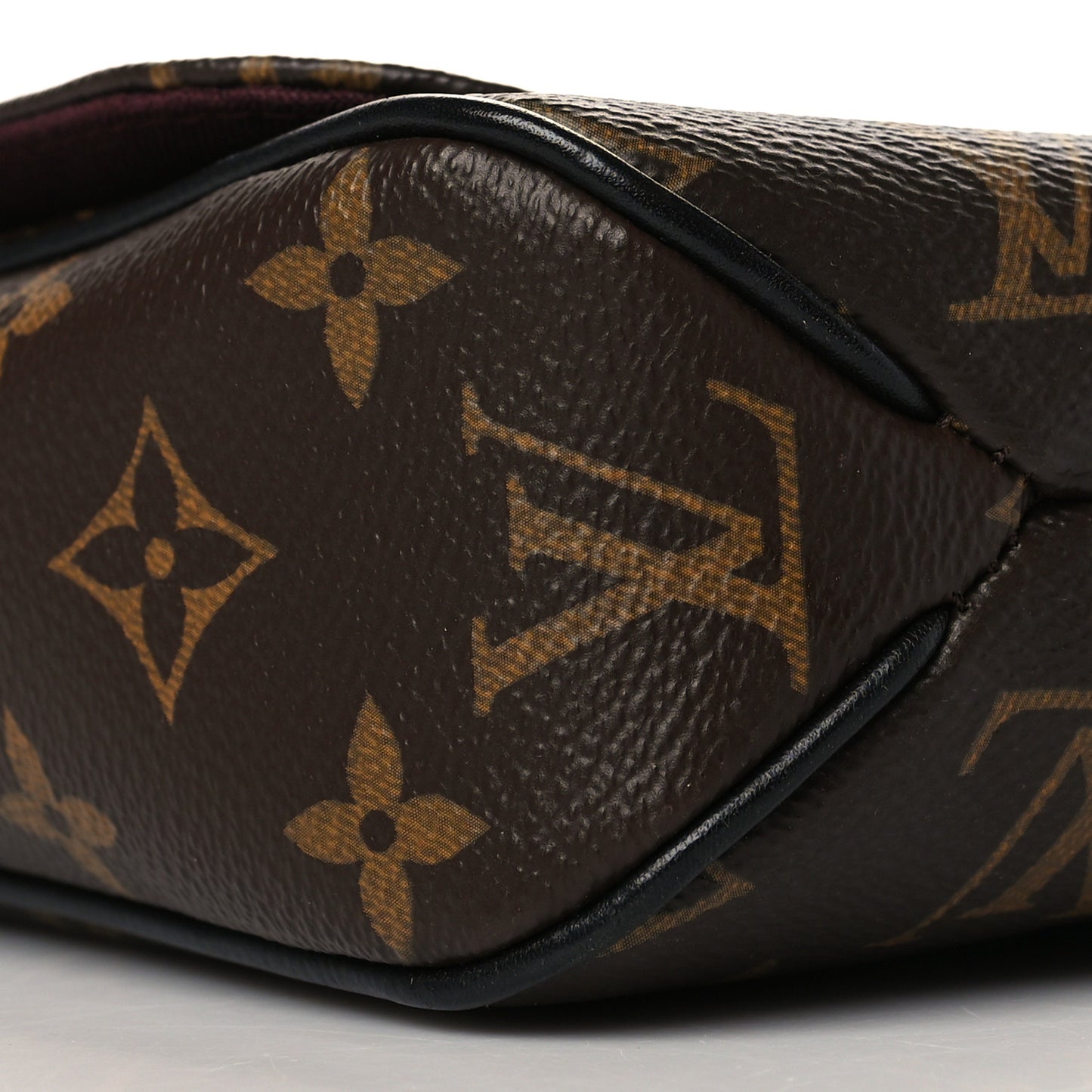 Monogram Macassar District PM