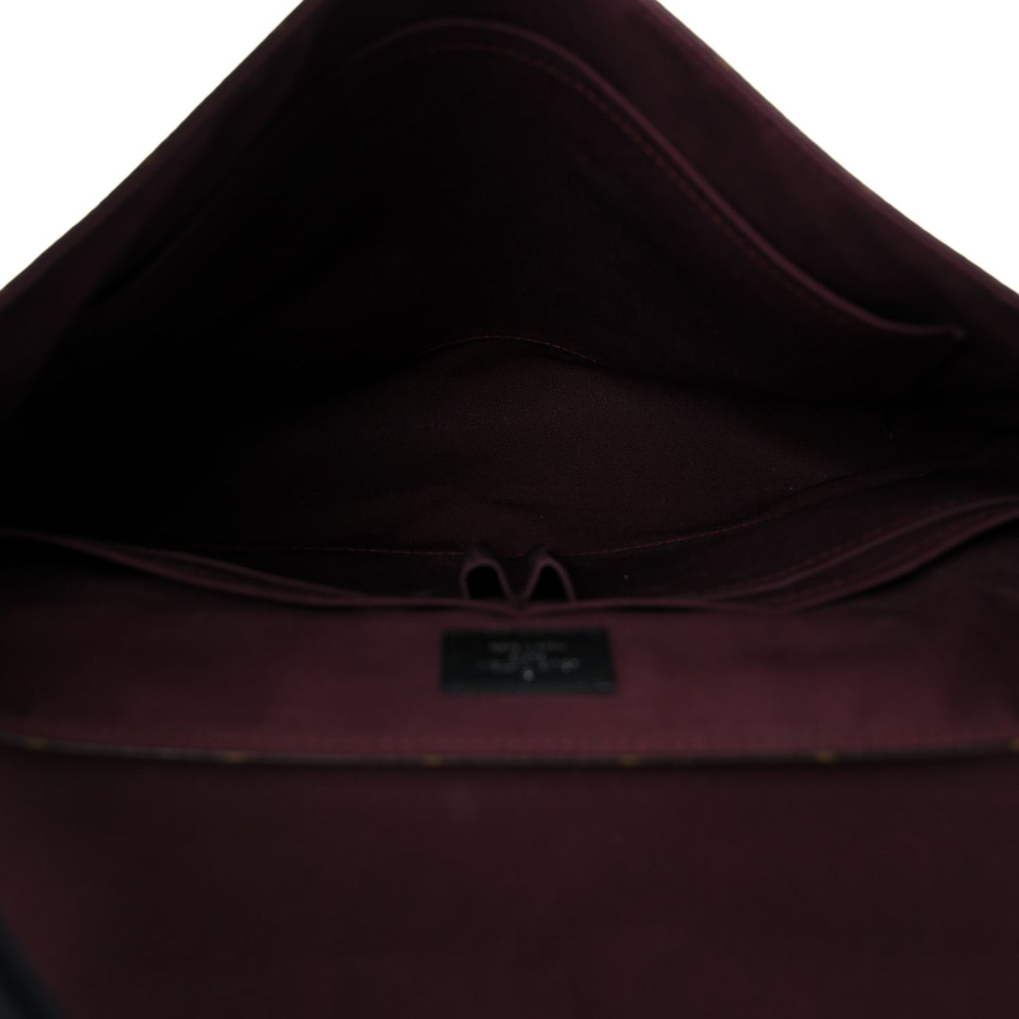 Monogram Macassar District MM