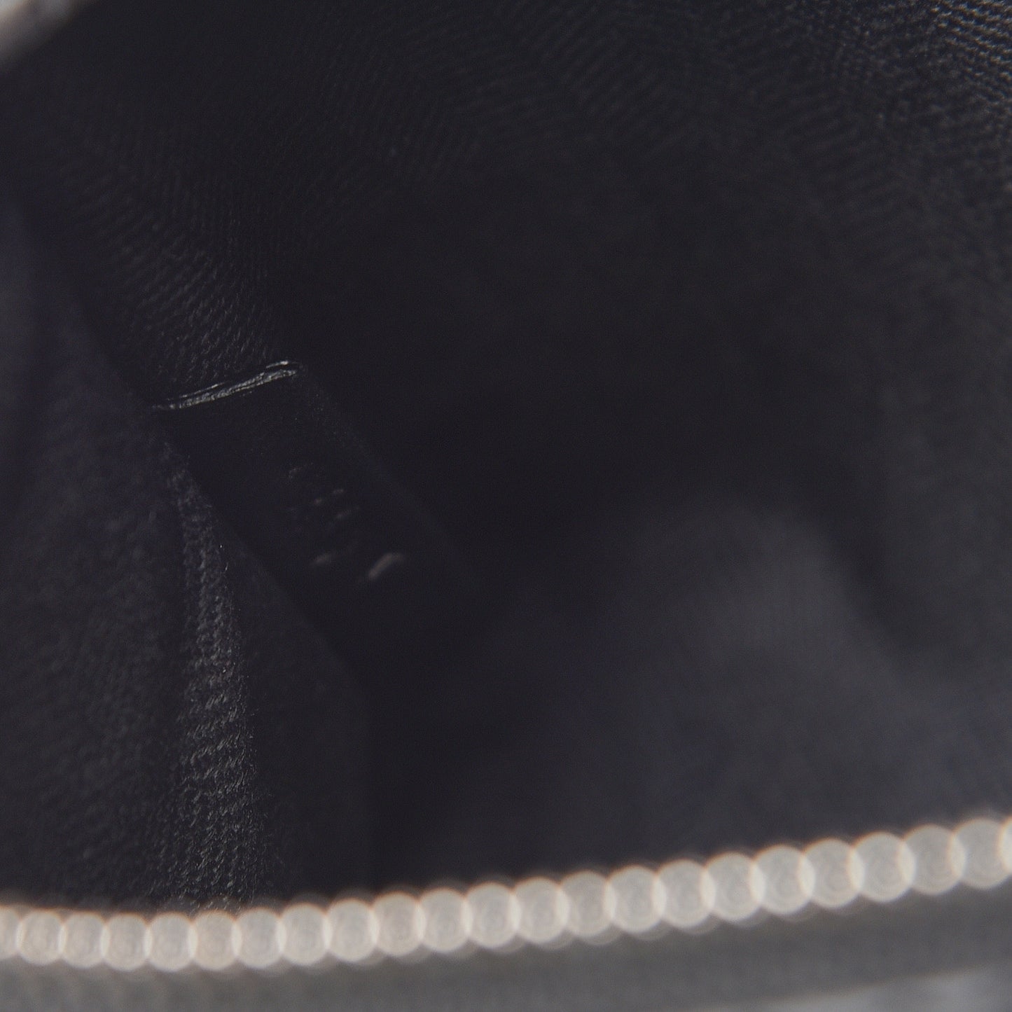 Calfskin Embossed Medium Repeat T Pouch Black