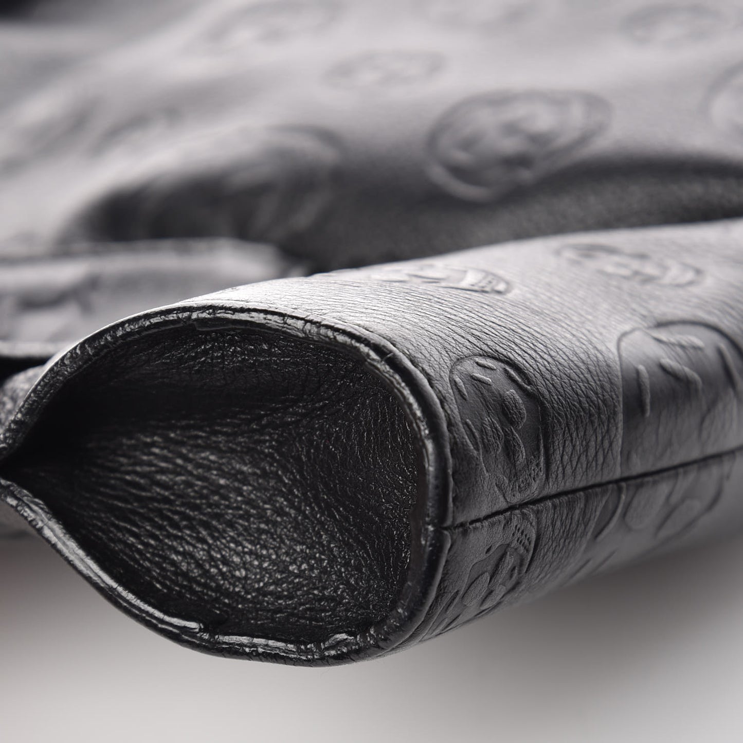 Calfskin Skull Embossed De Manta Clutch Black