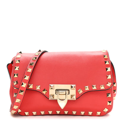 Valentino Garavani Vitello Mini Rockstud Flap Saddle Crossbody Bag Deep Orange 1 of 11