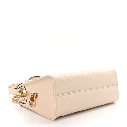 Louis Vuitton Empreinte Monogram Giant OnTheGo East West Creme 4 of 10