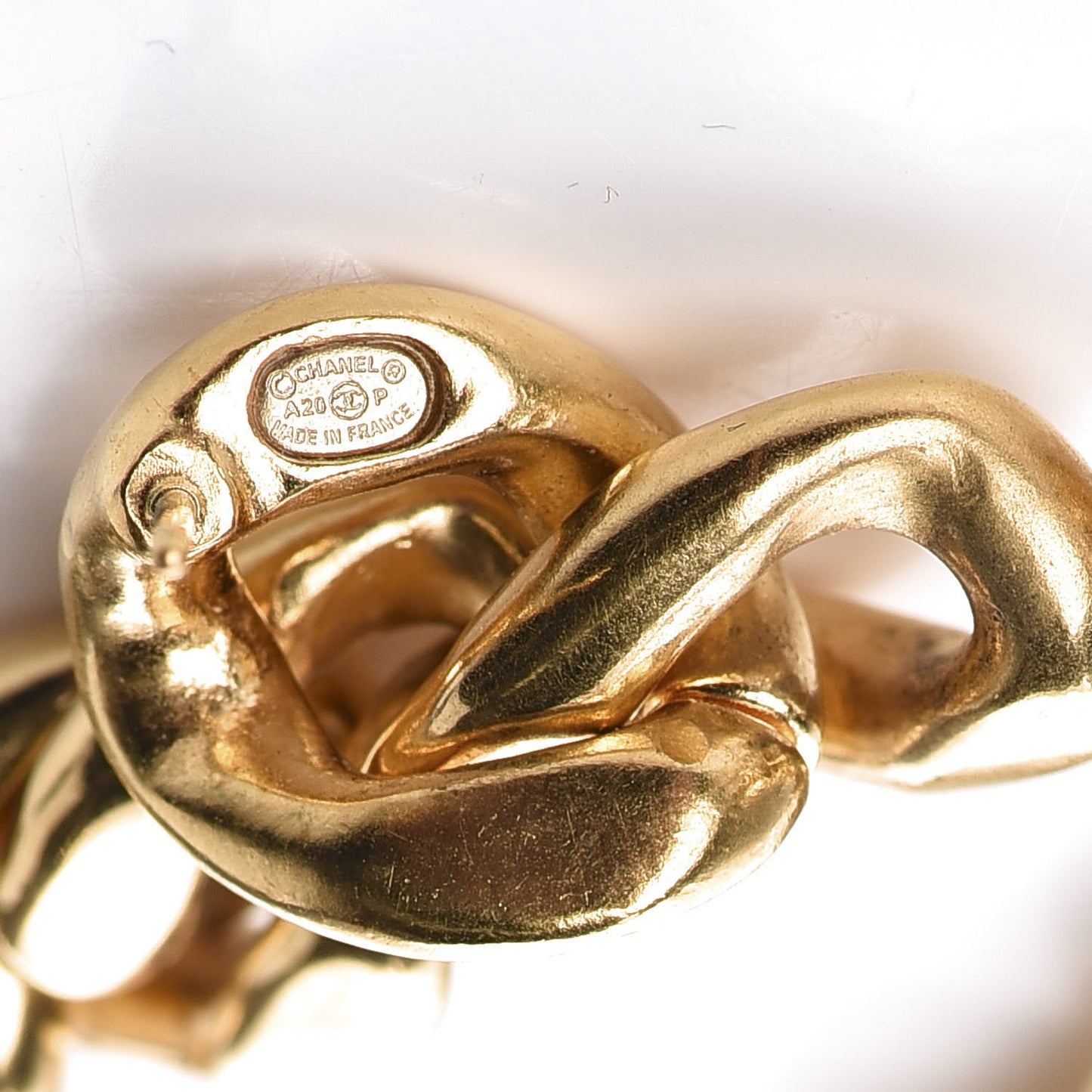 Metal CC Pick Drop Earrings Gold