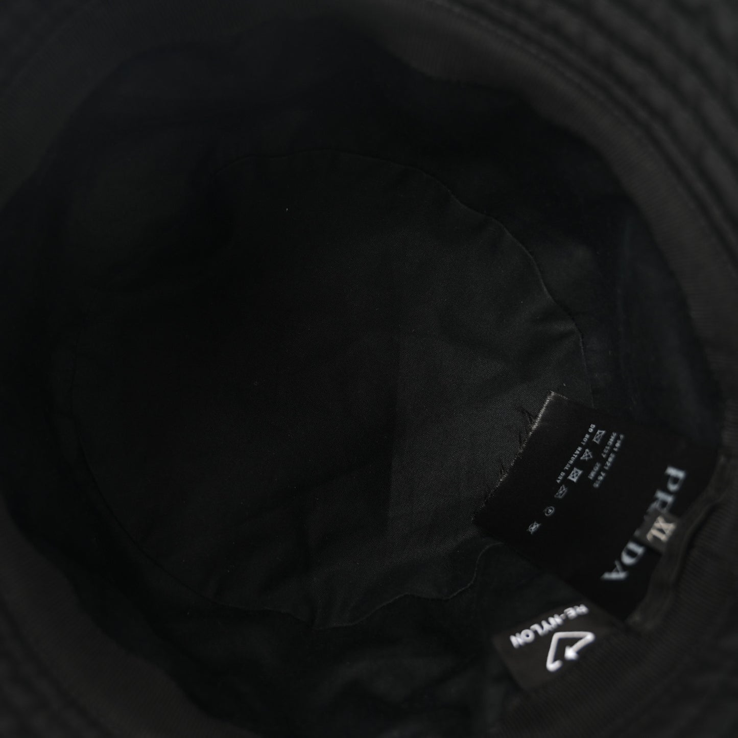 Re-Nylon Metal Triangle Logo Mens Bucket Hat XL Black