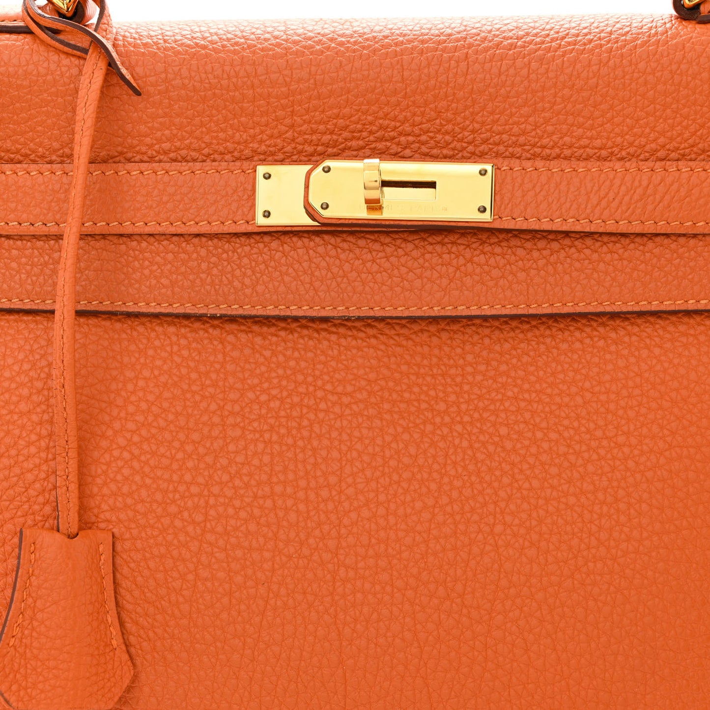 Togo Kelly Retourne 35 Orange