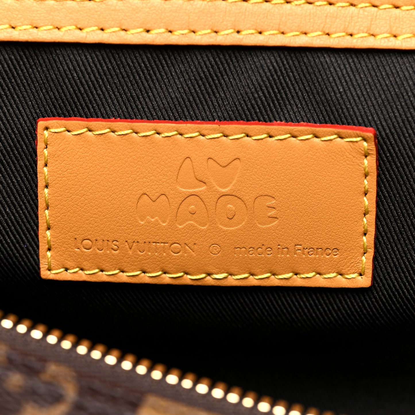 X NIGO Reverse Monogram Stripe Keepall Bandouliere 50 Brown