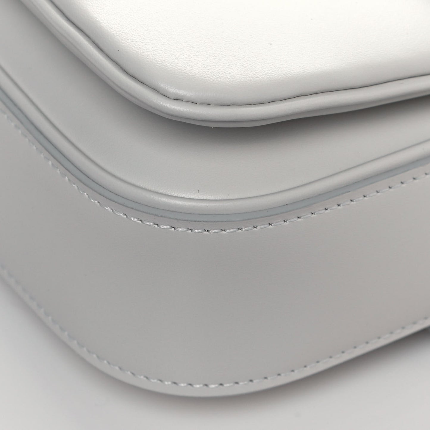 Calfskin Reverse Monogram Swing White