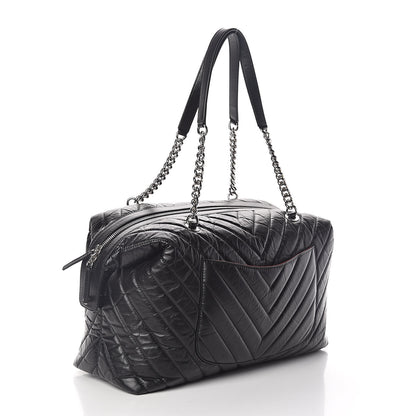 Chanel Aged Calfskin Chevron Quilted Duffle Bag Black 3 of 10
