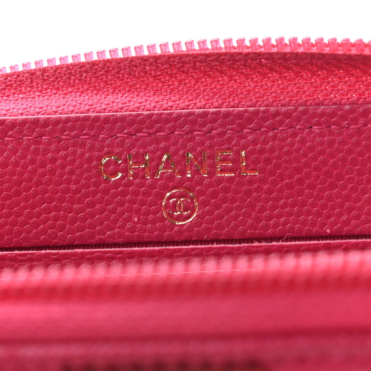 Caviar Quilted Small Boy Zip Around Wallet Fuchsia