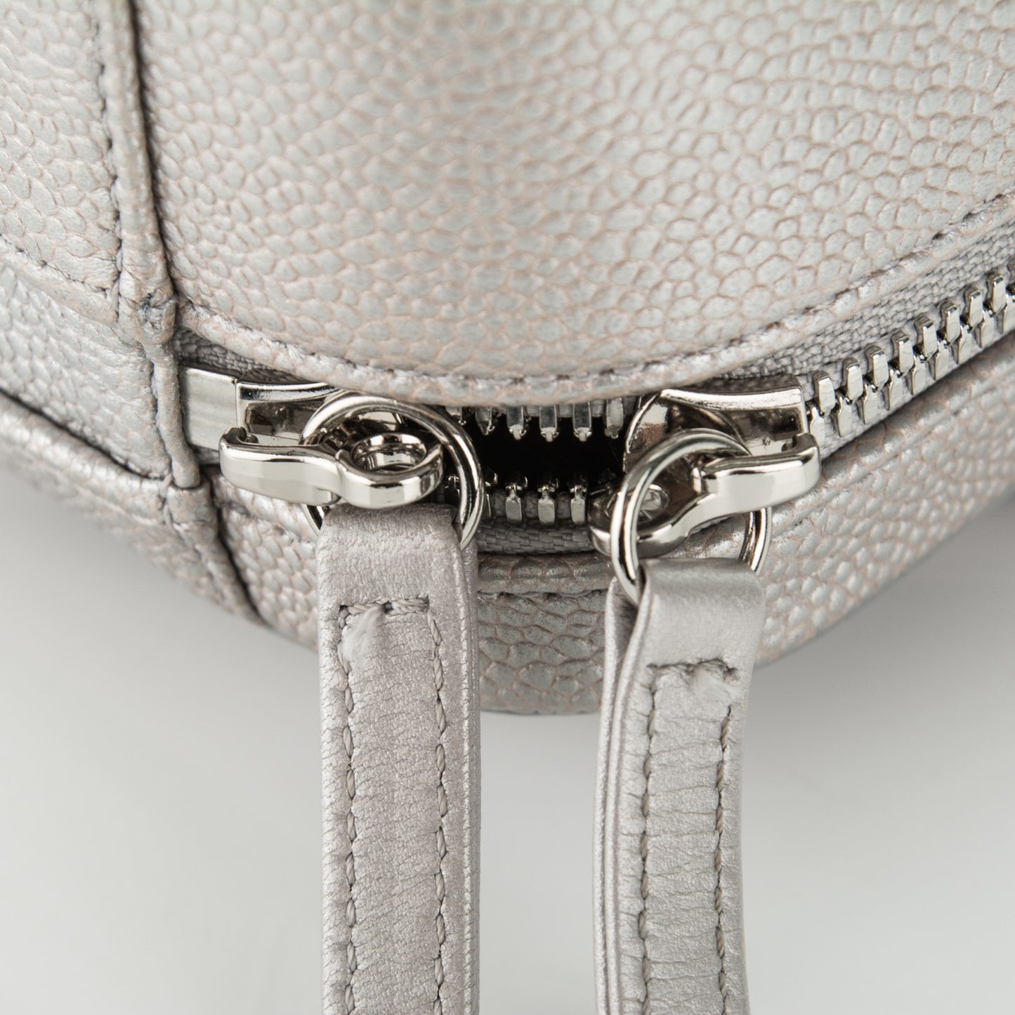 Metallic Caviar Quilted Medium CC Filigree Vanity Case Silver